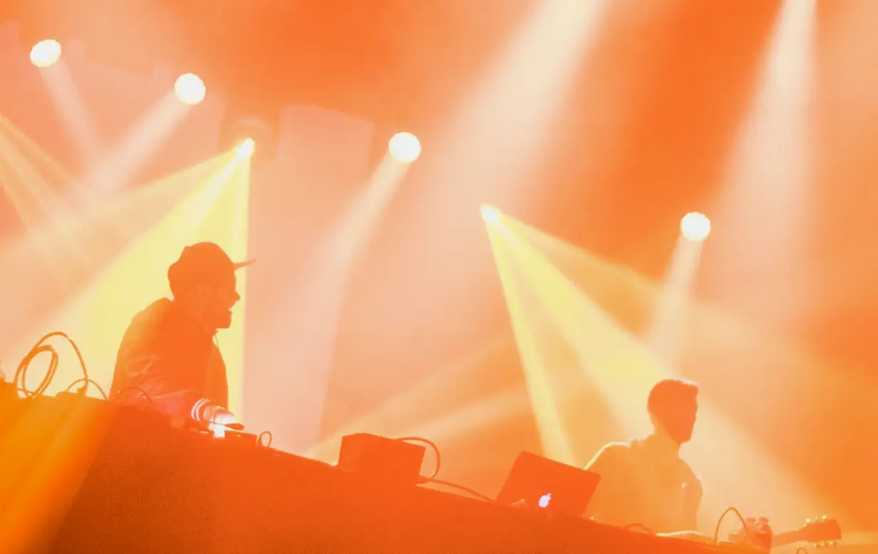 Live music with orange lighting